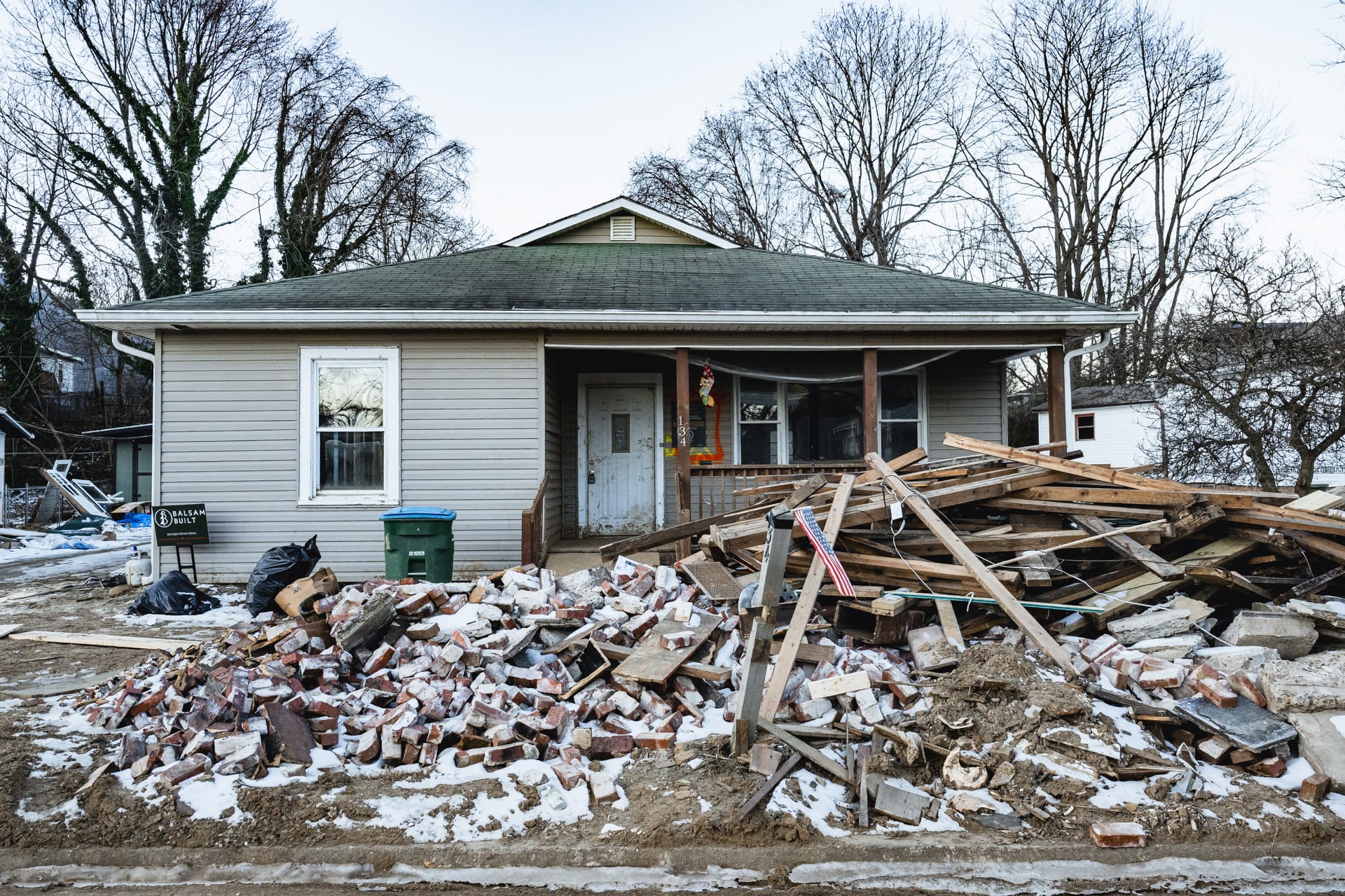 Shown: Catherine and Jeremy's house. The family left ahead of the storm. By the next morning, they could see from a distance that the home was the submerged to the gutters. | Fiasco Media