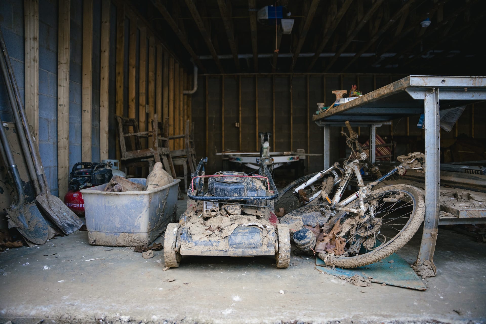 Inside an East Asheville house garage after the water has receded. | Fiasco Media