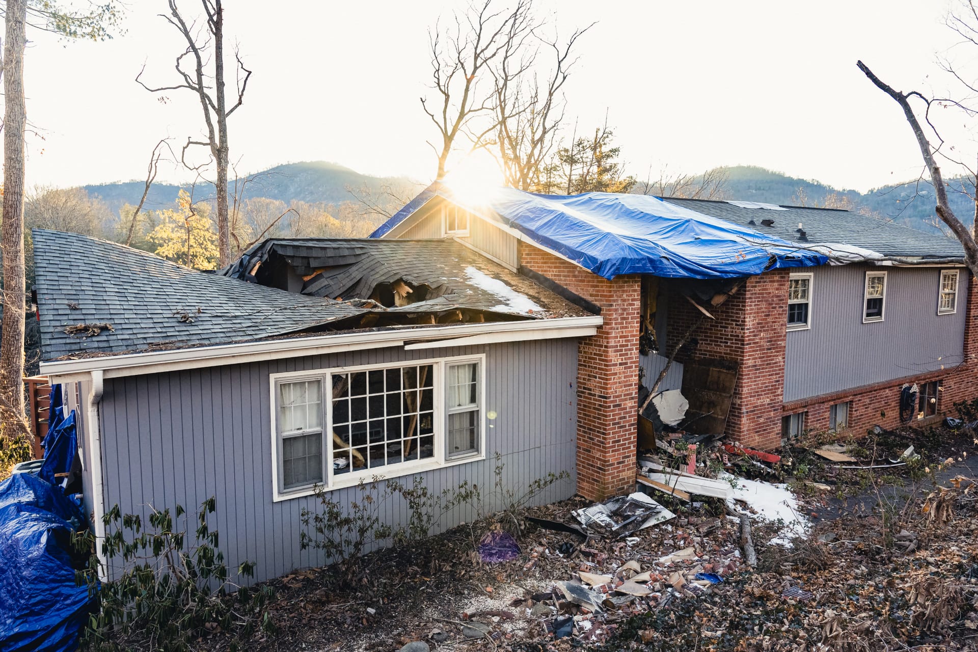 Melinda and Matt's house suffered excessive damage from trees that crashed through the roof. | Fiasco Media